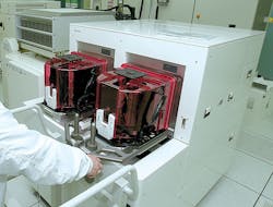Two front-opening unified pods, or FOUPs, are put through their paces at an IBM test center in the East Fishkill, N.Y., facility Two front-opening unified pods, or FOUPs, are put through their paces at an IBM test center in the East Fishkill, N.Y., facility
