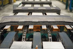 Making quality shingles economically requires ElkCorp to collect 6,500 pieces of information every few seconds. Only modern manu Making quality shingles economically requires ElkCorp to collect 6,500 pieces of information every few seconds. Only modern manu