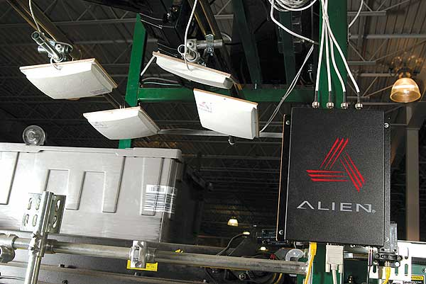 At Rockwell Automation, RFID tags on products are read as they pass in conveyor tubs under antennas.