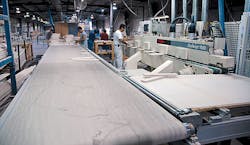 Customized machinery has helped Kent Moore Cabinets boost productivity by about 120 percent over the past 10 years. Customized machinery has helped Kent Moore Cabinets boost productivity by about 120 percent over the past 10 years.