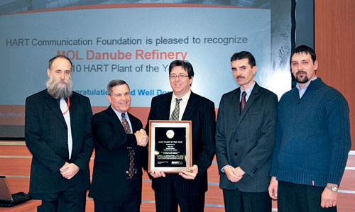 Hart Communication Foundation Executive Director Ron Helson (2nd from left) presents the 2010 Hart Plant of the Year Award to MO