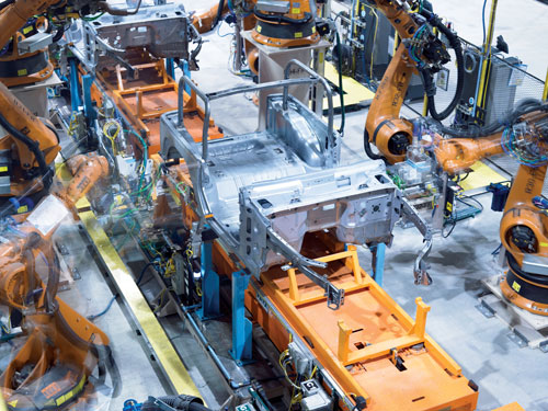A software-based safety system eliminates 85 percent of conventional safety components on the body-in-white assembly line in Kuk
