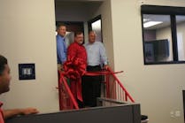 Cutting the ribbon (L-R) Kevin Hutchinson, Mayor, Columbia, Ill., Paul Galeski, CEO, and Kirk Norris, SVP Strategic Manufacturing Solutions.