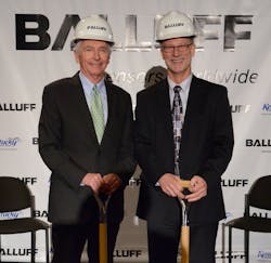 Governor Steve Beshear (left) and Balluff Inc. President Kent Howard celebrate Balluff&apos;s groundbreaking.