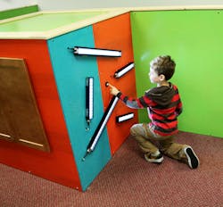 A child interacts with one of Banner Engineering&rsquo;s exhibits in The Sensor Zone.