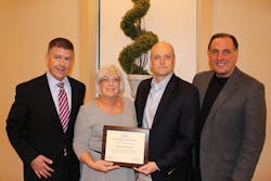 From left, WTCS Board President Drew Petersen; D &amp; S Human Resources Manager Sherrie Hein; D&amp;S Manufacturing Vice President and General Manager John Barkley; and Lee Rasch, president of Western Technical College.