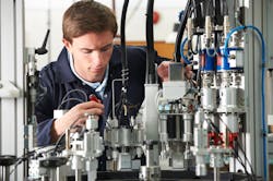 In this photo, an engineer works on complex machinery. Manufacturing’s resurgence creates demand for skilled technicians In this photo, an engineer works on complex machinery. Manufacturing’s resurgence creates demand for skilled technicians