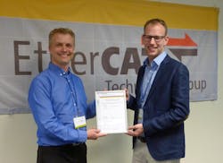 ETG representative Florian Häfele (right) awarded the first official North American conformance certificate to Watlow's Stan Breitlow. ETG representative Florian Häfele (right) awarded the first official North American conformance certificate to Watlow's Stan Breitlow.