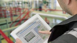 Aw 28327 Man In Helmet Holding Ipad Over Shoulder Close Up Aw 28327 Man In Helmet Holding Ipad Over Shoulder Close Up