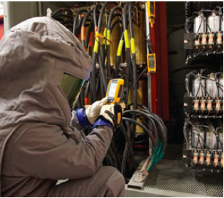 Keithly Project Manager Zach Bryson uses a Fluke CNX compatible infrared camera to inspect fuses and power capacitors while the