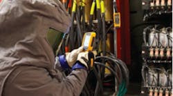 Keithly Project Manager Zach Bryson uses a Fluke CNX compatible infrared camera to inspect fuses and power capacitors while the Keithly Project Manager Zach Bryson uses a Fluke CNX compatible infrared camera to inspect fuses and power capacitors while the