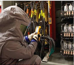 Keithly Project Manager Zach Bryson uses a Fluke CNX compatible infrared camera to inspect fuses and power capacitors while the Keithly Project Manager Zach Bryson uses a Fluke CNX compatible infrared camera to inspect fuses and power capacitors while the