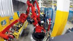 Production of the Vespa Primavera using Comau automation at Piaggio&apos;s manufacturing facility.