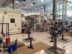 Orange pads positioned beneath the analytical equipment shelters can be pumped with air to let the buildings skate easily across the floor. Orange pads positioned beneath the analytical equipment shelters can be pumped with air to let the buildings skate easily across the floor.