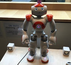 A robot stands at the ready to direct visitors to where they want to go on Microsoft&apos;s campus.