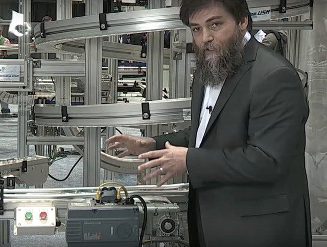 Siemens&apos; Rich Mintz and the Sinamics G110M gear motor drive on a conveyor application.