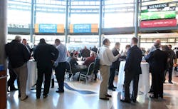 Networking at the 2015 Manufacturing in America event.