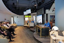 Microsoft employees act out a scenario in the Microsoft Technology Center Houston’s Envisioning Center to demonstrate how cloud technologies could be used in the oil and gas industry. Microsoft employees act out a scenario in the Microsoft Technology Center Houston’s Envisioning Center to demonstrate how cloud technologies could be used in the oil and gas industry.