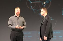 Eric Knapp (left), global director of cybersecurity solutions and technology for HPS, talks with CTO Bruce Calder about the state of cybersecurity today.