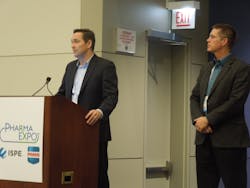 Optel Vision&apos;s Mario Simard (at podium) and Steve Peterson co-presented &apos;Serialization-Regulatory Compliance&apos; on Tuesday, Nov. 8
