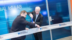 NI&rsquo;s Jamie Smith (left) and Alex Davern cut the ribbon on the company&rsquo;s Industrial IoT Lab.