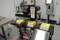Serialized cartons are shown here as they output from the Nutec carton conveyor.