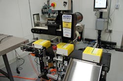 Serialized cartons are shown here as they output from the Nutec carton conveyor. Serialized cartons are shown here as they output from the Nutec carton conveyor.