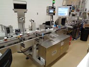 Scalable software helps pharma firm quickly serialize products from several bottling lines. New bottle labeler, camera and printer all contribute to a track-and-trace solution.