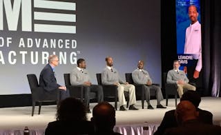 Joe Allie, business manager, global competency, for Rockwell Automation, moderates a panel discussion with four of the first graduates of the Academy of Advanced Manufacturing (from left to right): Chris Allison, Dre Davis, Travis Tolbert and Scott Bingham.