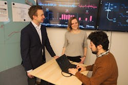 Engineers in discussion at the Collaborative Operations Center in Oslo. Source: ABB