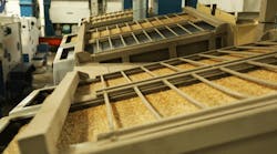 The milling process features multiple pieces of equipment located on three stories to clean the rice kernels for packaging.
