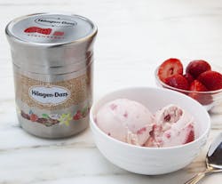 A metal container for H&auml;agen-Dazs ice cream keeps contents frozen.