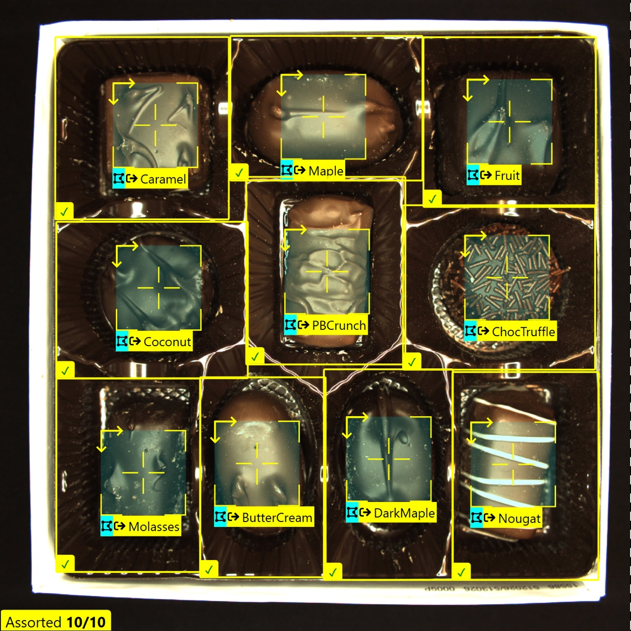 Cognex Deep Learning quality inspection software can be trained to identify correct placement and types of items assembled or packaged. In this consumer packaged goods example, it's assorted chocolates in a package. Source: Cognex