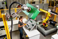 View of a FreeMove vision sensor positioned above a workcell. View of a FreeMove vision sensor positioned above a workcell.