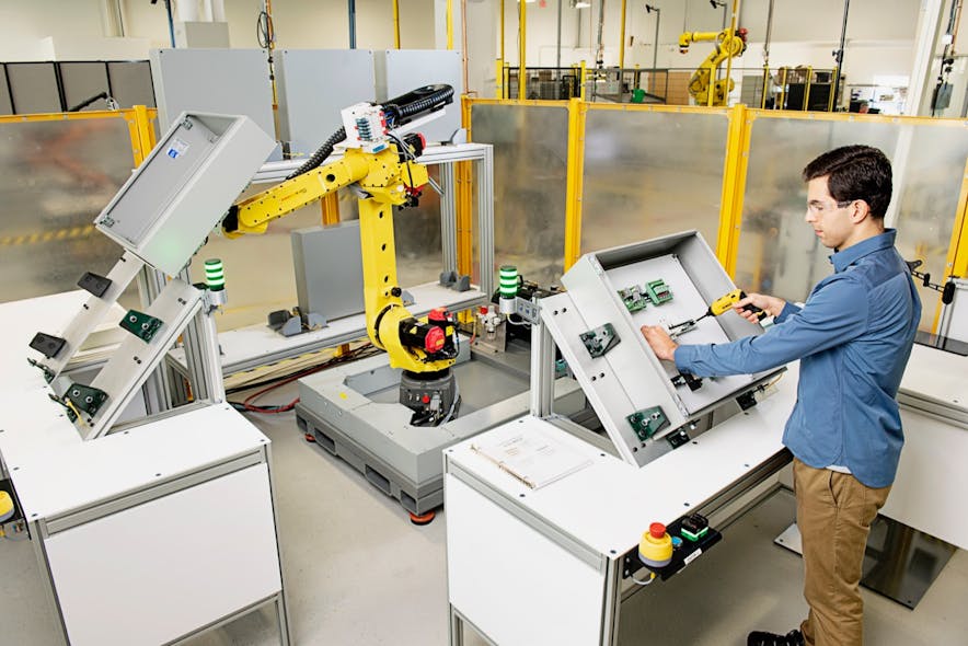 Workcell example illustrating how a human can work alongside an uncaged industrial robot using Veo Robotics&apos; FreeMove system.