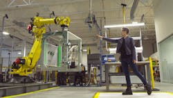 Veo Robotics co-founder Clara Vu tests robot interaction with the company's FreeMove system. Veo Robotics co-founder Clara Vu tests robot interaction with the company's FreeMove system.