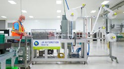 GM engineer work on final testing and validation of medical mask assembly line from JR Automation. GM engineer work on final testing and validation of medical mask assembly line from JR Automation.