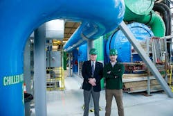 Professor Stuart Madnick (left) and graduate student Shaharyar Khan, working with Professor James Kirtley (not shown), found several vulnerabilities when they applied MIT’s cybersafety method in this small power plant. The plant is susceptible to cyberattacks because it uses software, rather than mechanical devices, to keep the turbines from exceeding their control limits. Photo credit: Stuart Darsch Professor Stuart Madnick (left) and graduate student Shaharyar Khan, working with Professor James Kirtley (not shown), found several vulnerabilities when they applied MIT’s cybersafety method in this small power plant. The plant is susceptible to cyberattacks because it uses software, rather than mechanical devices, to keep the turbines from exceeding their control limits. Photo credit: Stuart Darsch