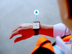 The wearable Kinexon SafeTag warns the user, audibly and visually, when the physical distance with another employee has been compromised. The wearable Kinexon SafeTag warns the user, audibly and visually, when the physical distance with another employee has been compromised.