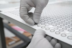 With more than 1,000 disks on each sheet, disk picking by hand was extremely time-consuming. With more than 1,000 disks on each sheet, disk picking by hand was extremely time-consuming.