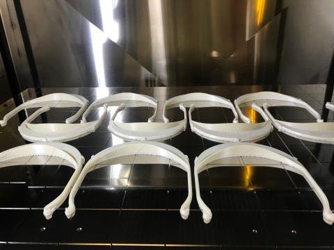 Face shield head mounts manufactured by Stratasys using additive manufacturing. Source: Stratasys
