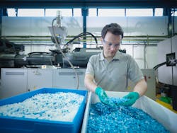 Worker inspecting recycled plastic in plastics factory. Source: Getty Images Worker inspecting recycled plastic in plastics factory. Source: Getty Images