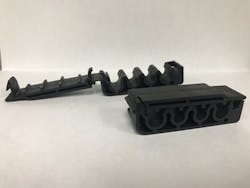 Injection molded fuel-line clips for Ford's Super Duty F-250 trucks made with used 3D printed powders and parts. Injection molded fuel-line clips for Ford's Super Duty F-250 trucks made with used 3D printed powders and parts.