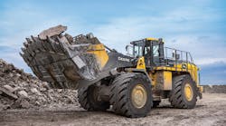 John Deere Hybrid 944K Wheel Loader distributing aggregate in Georgetown, Texas. John Deere Hybrid 944K Wheel Loader distributing aggregate in Georgetown, Texas.