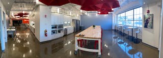 MassRobotics provides resident companies with furnished office space, private lab benches, and access to prototyping equipment.