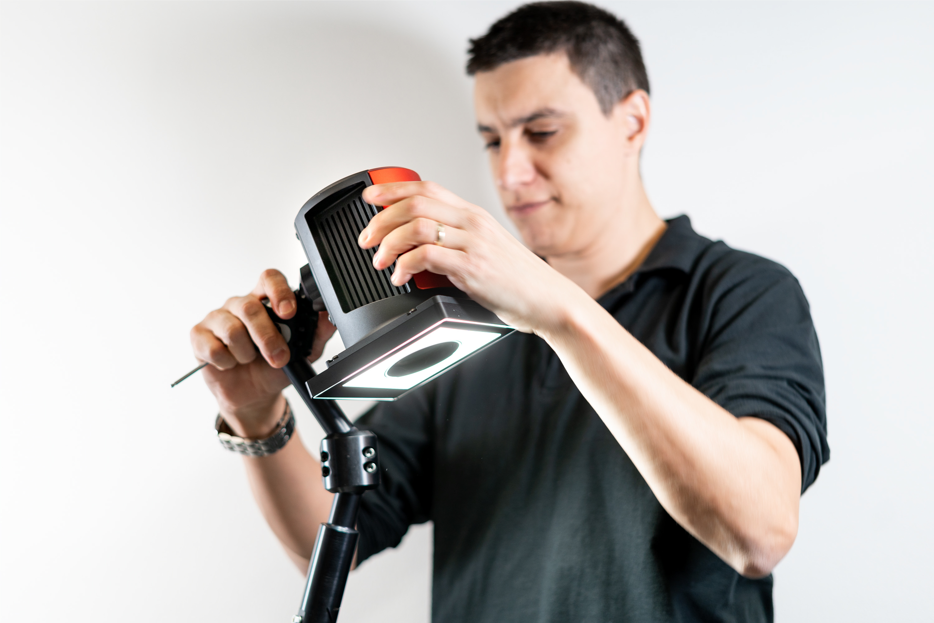 A technician calibrates an Inspekto S70 autonomous machine vision system.