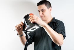 A technician calibrates an Inspekto S70 autonomous machine vision system. A technician calibrates an Inspekto S70 autonomous machine vision system.