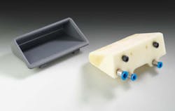 Molded part (left) and additively manufactured gripper. Source: Arburg Molded part (left) and additively manufactured gripper. Source: Arburg