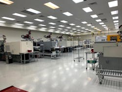 Trademark Plastics Inc. is continually implementing automation within the Class 8 clean rooms with end-of-arm tooling and index conveyors. Trademark Plastics Inc. is continually implementing automation within the Class 8 clean rooms with end-of-arm tooling and index conveyors.