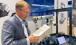 Enrico Krog Iversen, CEO of OnRobot, demonstrates the D:Ploy system at IMTS 2022. Enrico Krog Iversen, CEO of OnRobot, demonstrates the D:Ploy system at IMTS 2022.